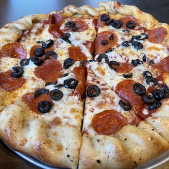 Wild Garlic Pizza & Pub - Medium pepperoni and olive pizza - Pubs Near Me - Reno, Nevada Wild Garlic Pizza & Pub - Medium pepperoni and olive pizza - Pubs Near Me - Reno, Nevada
