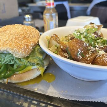 OWL - This is egg sandwich with chorizo and additional groceries, cilantro potatoes- both true bangers! - Mexican Near Me - Royal Oak, Michigan OWL - This is egg sandwich with chorizo and additional groceries, cilantro potatoes- both true bangers! - Mexican Near Me - Royal Oak, Michigan
