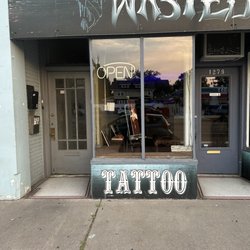 Wasted Space Tattoo - Open sign blinking.