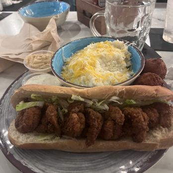 Warehouse at Vaughn's - Poboy from anchor with the grits. Loved it! - Food Court Near Me - Simpsonville, South Carolina Warehouse at Vaughn's - Poboy from anchor with the grits. Loved it! - Food Court Near Me - Simpsonville, South Carolina