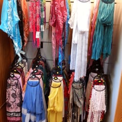 Lil'shoppe of Leather 2 - Every color imaginable in scarves... Great gifts for friends at home.