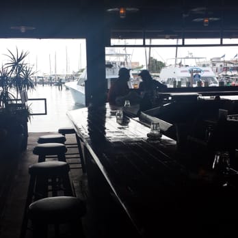 Conch Republic Seafood - Looking out to boatyard - Seafood Near Me - Key West, Florida