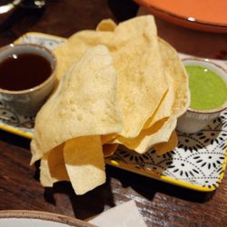 GourmIndia - Free appetizer with tamarind and cilantro mint sauce. Very crispy and addicting