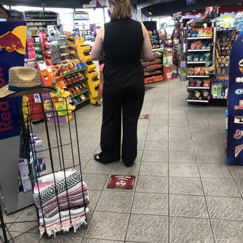 Terrible Herbst - a woman in a grocery store - Convenience Stores Near Me - Henderson, Nevada