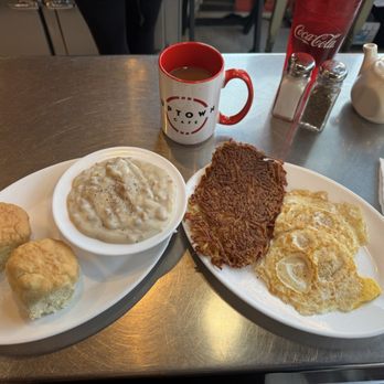 Sunrise Cafe @ Uptown - this breakfast combo was a amazing serving of biscuits sausage & gravy, 2 fried eggs and crispy flattened hashbrowns with coffee - Breakfast & Brunch Near Me - Noblesville, Indiana