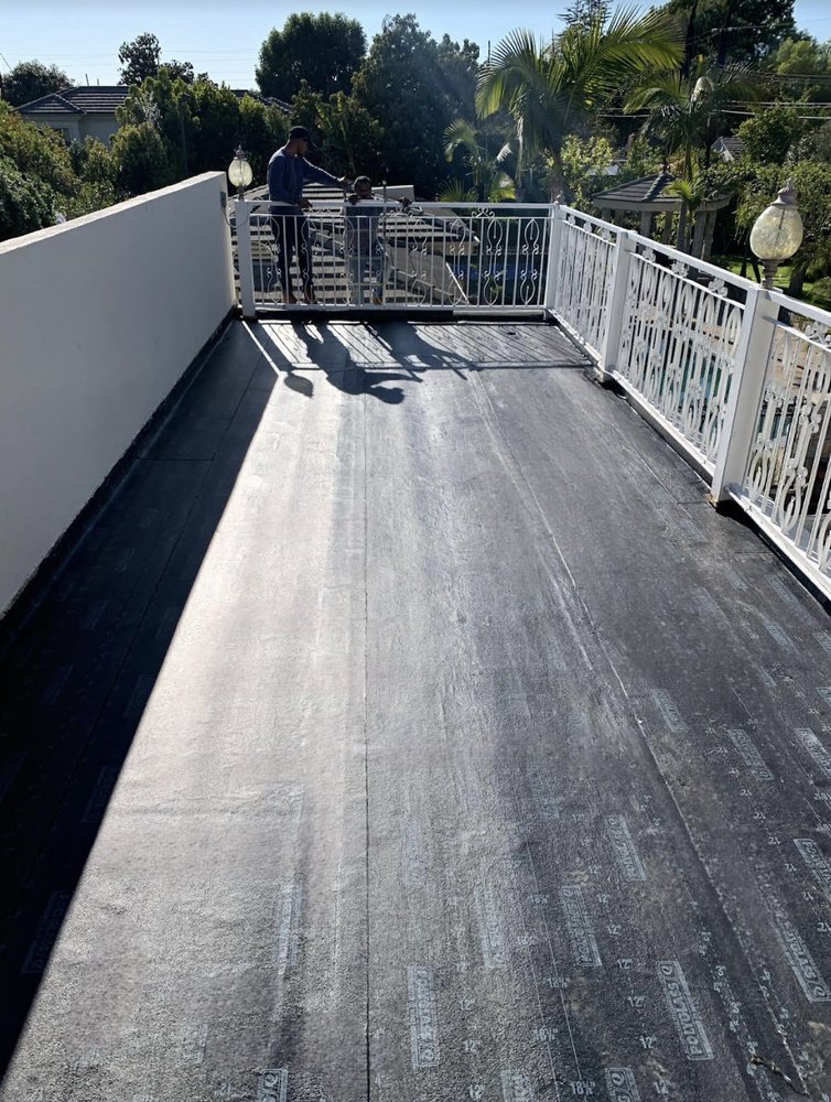 Slide of Goliath Roofing