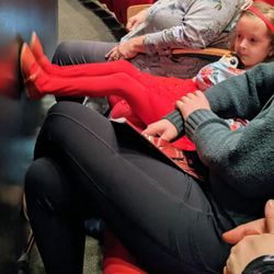 Wheelock Family Theatre - My daughter is 40" even she had trouble stretching out in the front row.  Thought this was a good visual for just how close the front row is