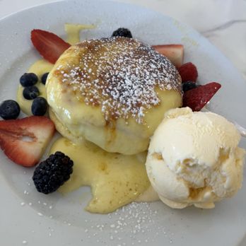 Fluffy Fluffy - These crème brûlée soufflé pancakes were everything--light, fluffy, and perfectly torched on top. Sweet, creamy perfection in every bite! - Pancakes Near Me - Tucker, Georgia