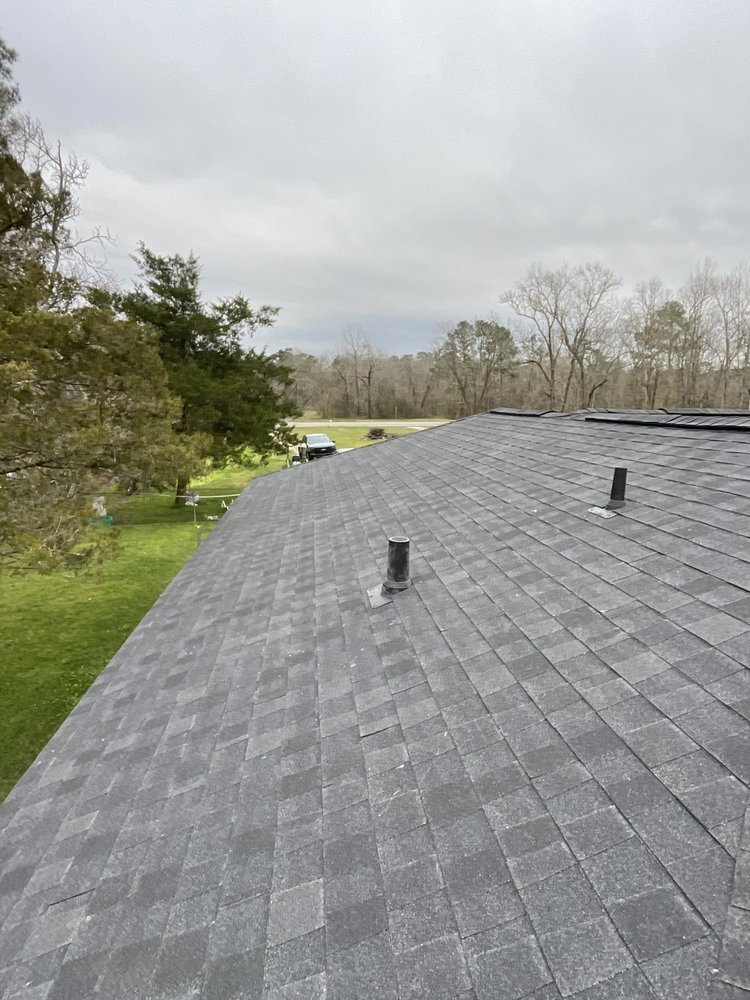 Slide of DMC Roofing