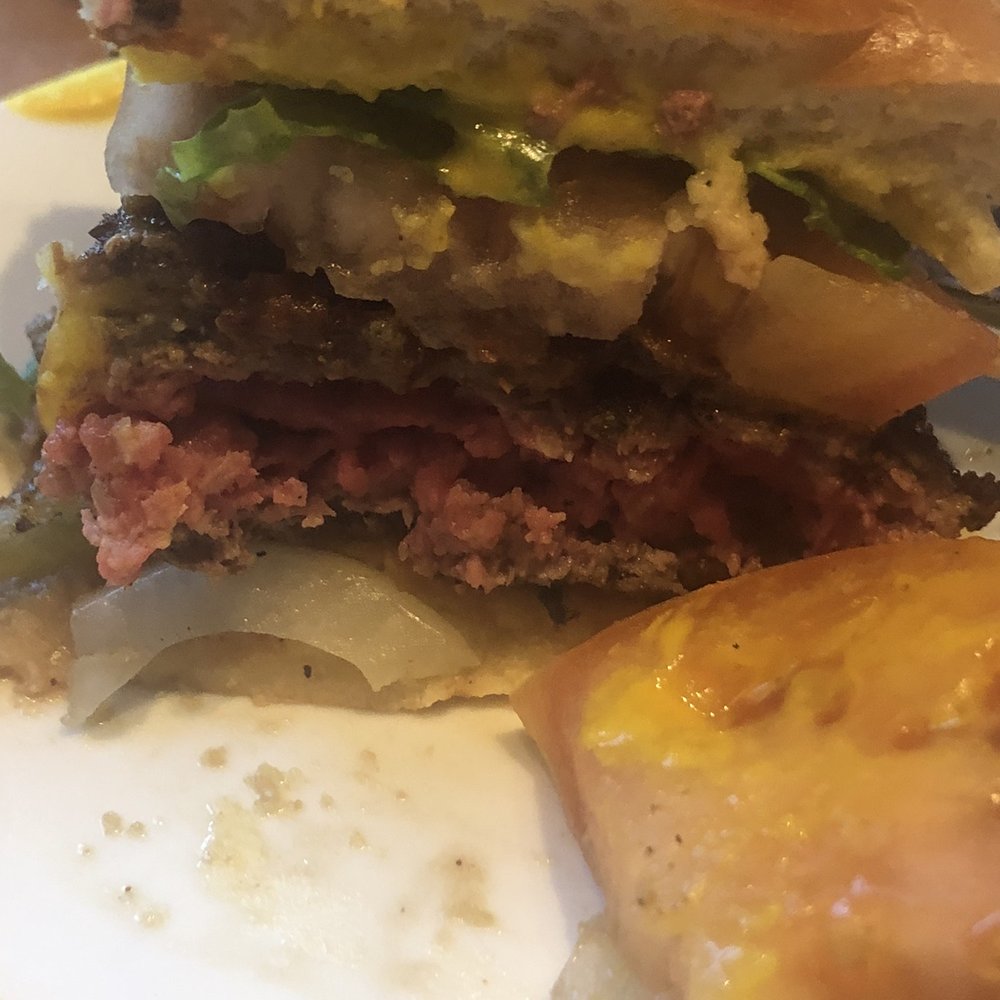 Roaring Fork - "Big ass burger" cut in half. - New American Near Me - Austin, Texas Roaring Fork - "Big ass burger" cut in half. - New American Near Me - Austin, Texas