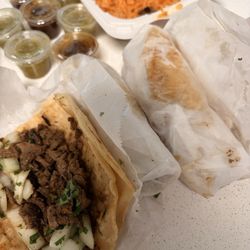 El Taco Express - Carne asada street tacos and side of Mexican rice.