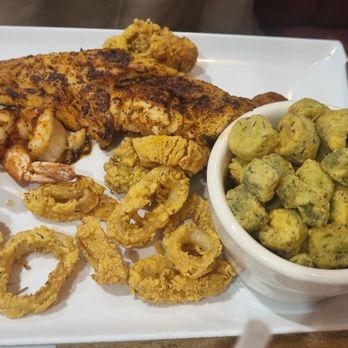 Pier House - Pier platter. Trout, calamari, shrimp, and fried okra. - Bars Near Me - Orange Beach, Alabama Pier House - Pier platter. Trout, calamari, shrimp, and fried okra. - Bars Near Me - Orange Beach, Alabama