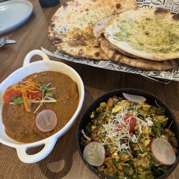 Varam - Goat curry, bread basket and okra - Indian Near Me - Redwood City, California Varam - Goat curry, bread basket and okra - Indian Near Me - Redwood City, California