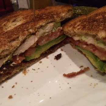 Karvers Grille - Inside of chicken club .grilled chicken, avocado, bacon, tomato and pesto mayo. SO DAMN DELICIOUS!! - American Near Me - Holbrook, New York