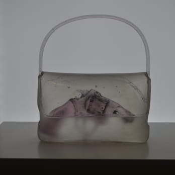 Hotel Murano - Hard to concealed carry when your purse is made of glass. - Hotels Near Me - Tacoma, Washington Hotel Murano - Hard to concealed carry when your purse is made of glass. - Hotels Near Me - Tacoma, Washington