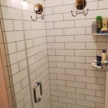 Delta Remodelers - a shower with a glass door - General Contractors Near Me - Lorton, Virginia Delta Remodelers - a shower with a glass door - General Contractors Near Me - Lorton, Virginia