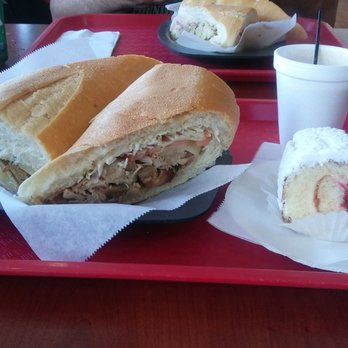 Ricomini Bakery - Pernil sandwich, decaf coffee, brazo gitano with guava and cheese - Bakeries Near Me - Isabela, Puerto Rico