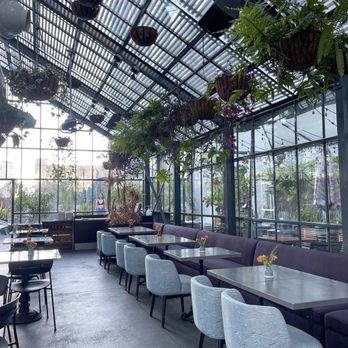 Openaire - Inside the gorgeous Greenhouse seating area - New American Near Me - Los Angeles, California