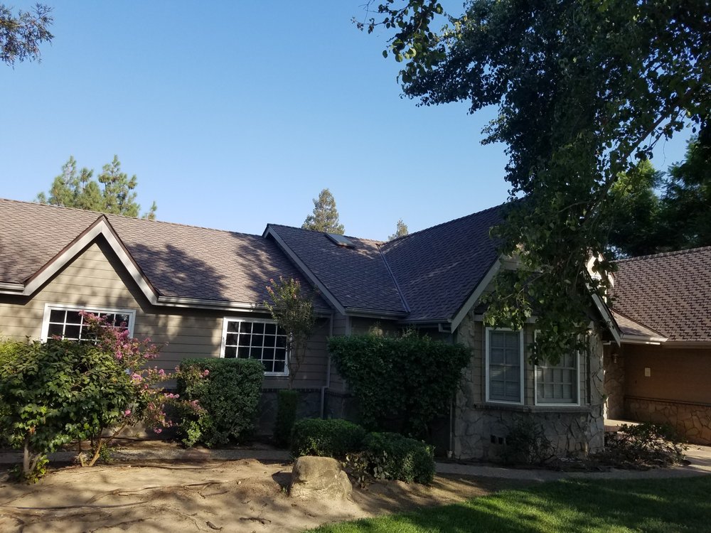 Slide of Green's Roofing