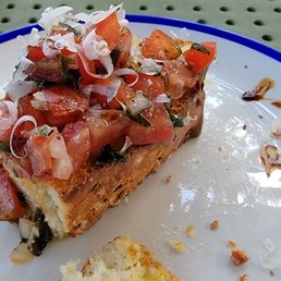 Bruschetta on toasted homemade focaccia. Bruschetta on toasted homemade focaccia.