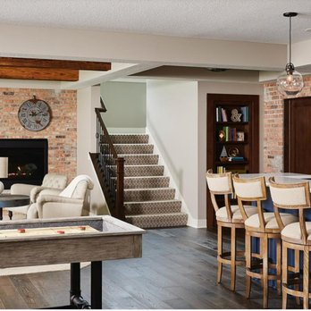 Two Bald Guys - a living room with a pool table - General Contractors Near Me - Cottage Grove, Minnesota Two Bald Guys - a living room with a pool table - General Contractors Near Me - Cottage Grove, Minnesota