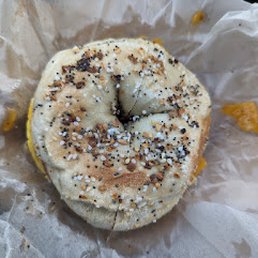 Taylor ham, egg, and cheese on an everything bagel Taylor ham, egg, and cheese on an everything bagel