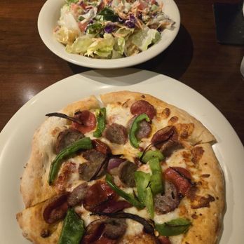 Stonefire Grill - $13 special. 7" the works pizza with salad and choice of carrot cake or cheesecake - American Near Me - Lakewood, California Stonefire Grill - $13 special. 7" the works pizza with salad and choice of carrot cake or cheesecake - American Near Me - Lakewood, California