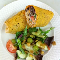 Steak burrito w/ rice nd beans sour cream pico the gallo nd camiloss creation salad