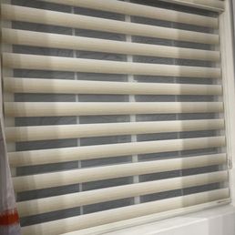 Window with custom zebra blind