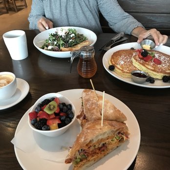 Maplewood Kitchen and Bar - My latte and chicken club, mom's black coffee and Super Greens Salad, & Lemon Ricotta pancakes to share. - Breakfast & Brunch Near Me - Cincinnati, Ohio