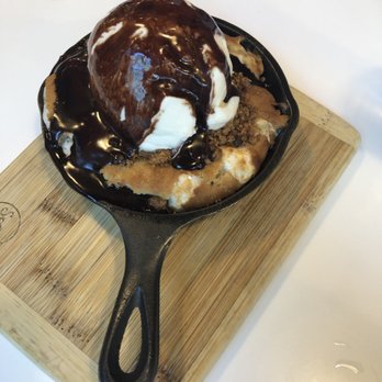 Spot Dessert Bar - Signature dessert cookie, s'mores, pretzels, topped with vanilla ice cream and chocolate sauce. - Desserts Near Me - Flushing, New York Spot Dessert Bar - Signature dessert cookie, s'mores, pretzels, topped with vanilla ice cream and chocolate sauce. - Desserts Near Me - Flushing, New York