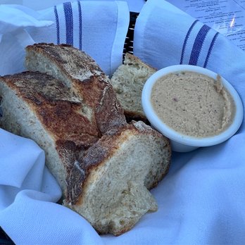 Olive Branch Restaurant - Complementary Hot bread with hummus with bits of black olive - Greek Near Me - Villas, New Jersey
