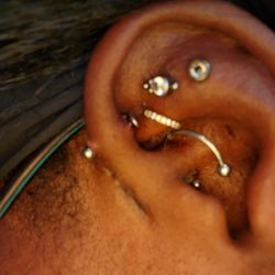 Ink Spot Tattoo - Botched piercings in question