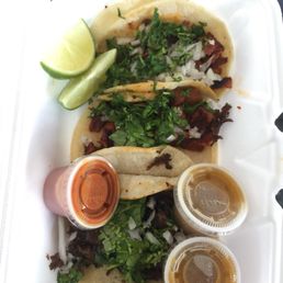 two adobada tacos and a cabesa taco two adobada tacos and a cabesa taco