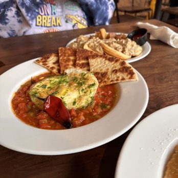 Rusk Kitchen & Bar - Shakshouka, with pita bread. - Cocktail Bars Near Me - Cincinnati, Ohio