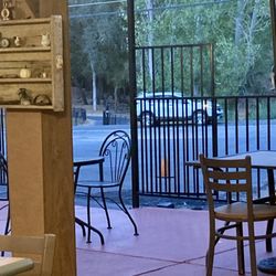 Outdoor seating only, and cars passing by are pretty loud.