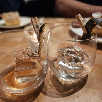 IDOL WOLF - empty glasses of the best old fashioned cocktail. - Tapas/Small Plates Near Me - Saint Louis, Missouri