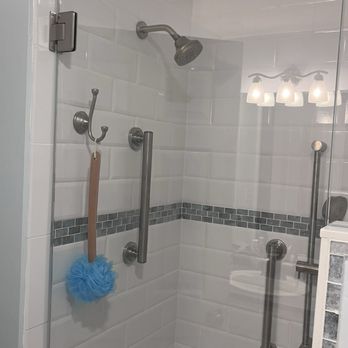 Mountain Ridge Remodeling - Beautiful work on the newly installed glass shower door along with two grab bars - General Contractors Near Me - Taunton, Massachusetts