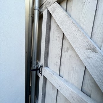 Texas Superior Painting - New fence gate built and stained. - Painters Near Me Texas Superior Painting - New fence gate built and stained. - Painters Near Me