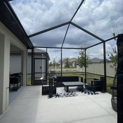 Screen enclosure with cement pad