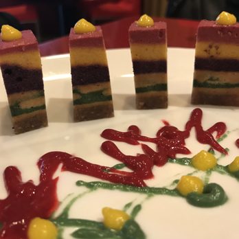 Au Lac - Rainbow Pie sweetened by dates and coconut nectar. This Living Foods dessert is made with layers of coconut, blueberry, raspberry, spirulina - Vietnamese Near Me - Fountain Valley, California