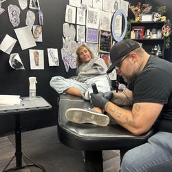 Matriarch Gallery - Me getting inked by Rob