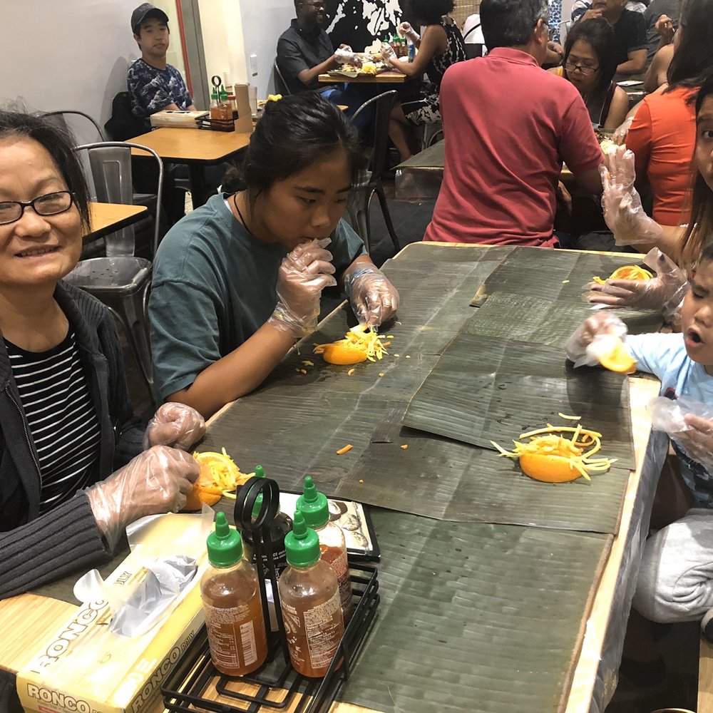 Tinuno - My family trying to decide how they want to go about eating with their hands... lol - Filipino Near Me - Toronto, Ontario