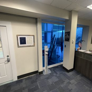 JAX Military Lounge - Front door and welcome desk - Airport Lounges Near Me - Jacksonville, Florida JAX Military Lounge - Front door and welcome desk - Airport Lounges Near Me - Jacksonville, Florida