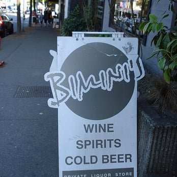 Bimini Beer & Wine Store - a sign on the sidewalk - Beer, Wine & Spirits Near Me - Vancouver, British Columbia