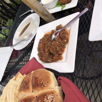 LEYLA MEDITERRANEAN - Acili Ezme is a spicy and flavorful cold appetizer that's great on Leyla's homemade breads. - Mediterranean Near Me - Cincinnati, Ohio LEYLA MEDITERRANEAN - Acili Ezme is a spicy and flavorful cold appetizer that's great on Leyla's homemade breads. - Mediterranean Near Me - Cincinnati, Ohio
