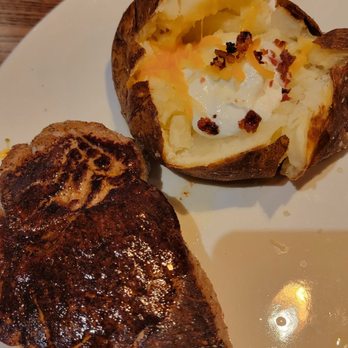 Outback Steakhouse - 8 oz ribeye and baked potato - Steakhouses Near Me - Concord, North Carolina