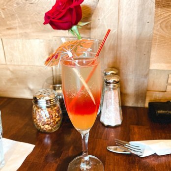 Pizzeria La Gitana- Olympia - a rose in a glass - Pizza Near Me - Olympia, Washington Pizzeria La Gitana- Olympia - a rose in a glass - Pizza Near Me - Olympia, Washington