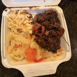 Irie Jam Souls - Oxtail with cabbage and mac and cheese