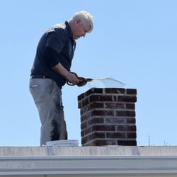 Rapid Response - Rapid Response founder, Andy, installing materials to keep wildlife out of a customer's home.